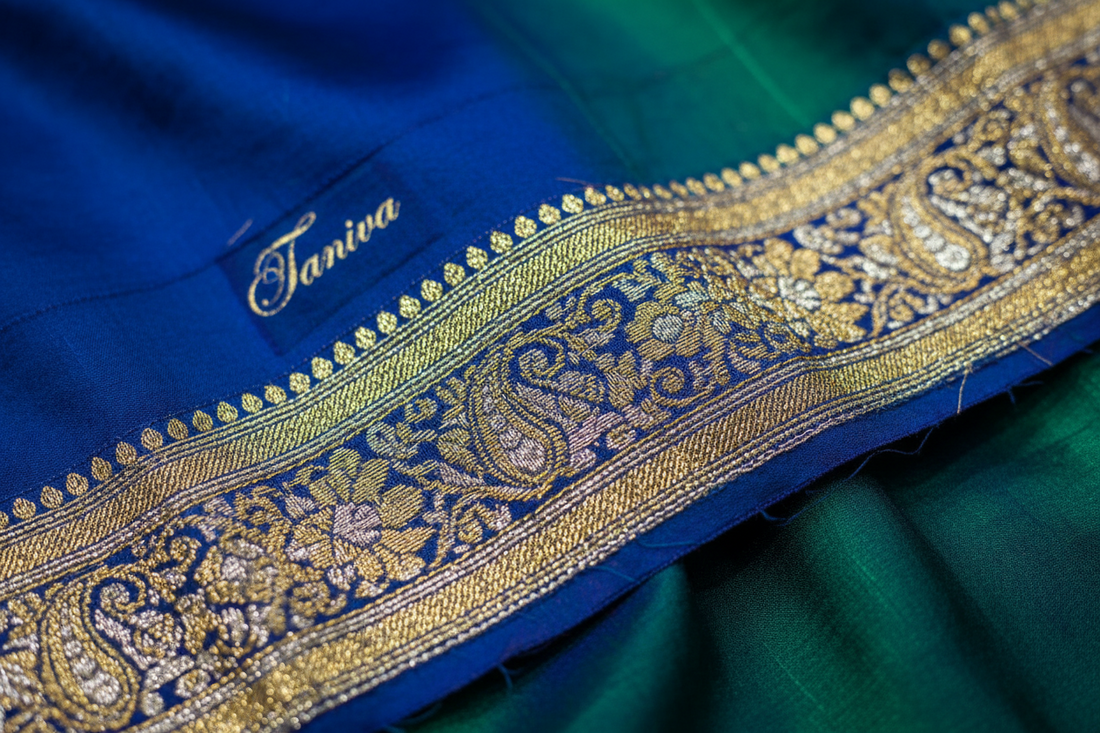 Elegant golden Banarasi zari border lace attached to a teal saree fabric.