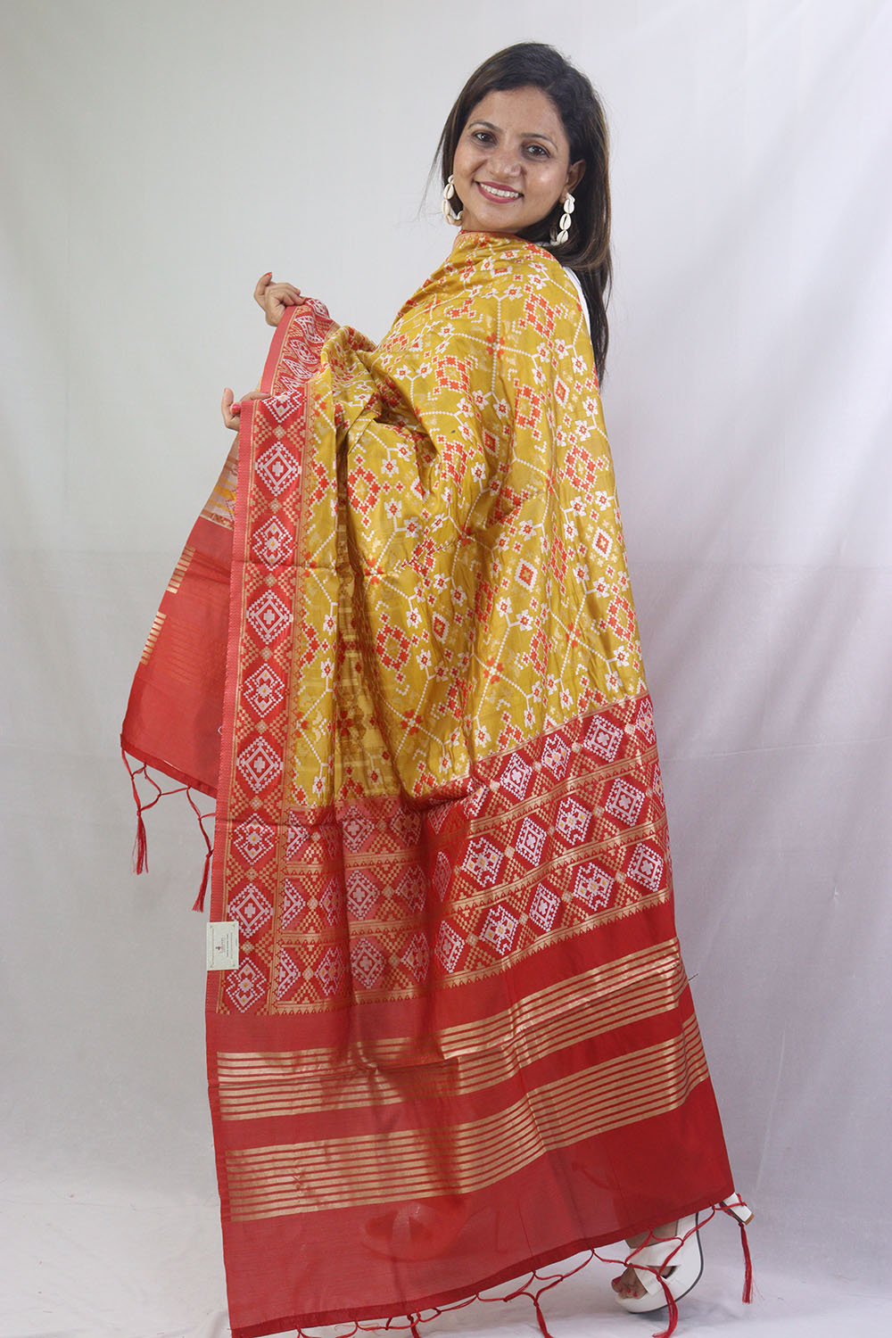 Stunning Yellow Patola Silk Dupatta - with a beautifully handcrafted matching tassel - Taniva