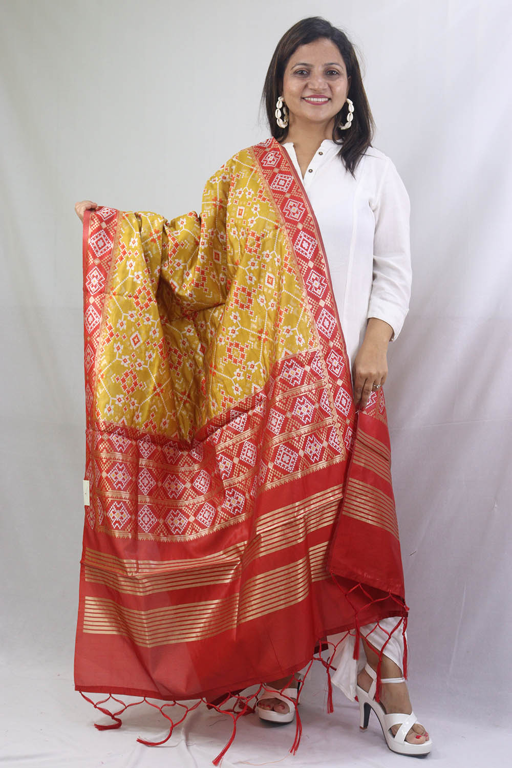 Stunning Yellow Patola Silk Dupatta - with a beautifully handcrafted matching tassel - Taniva