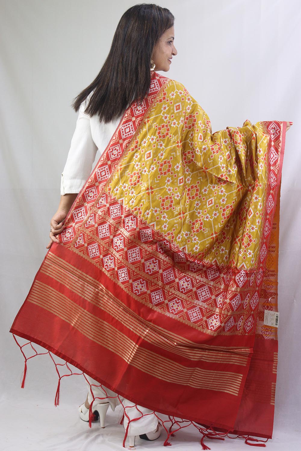 Stunning Yellow Patola Silk Dupatta - with a beautifully handcrafted matching tassel - Taniva
